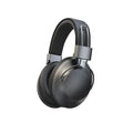 Black over-ear wireless headphones with sleek metal accents and padded headband for comfort