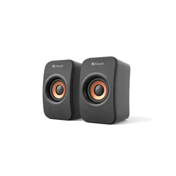 Compact black desktop speakers with copper drivers, ideal for computer audio and home office setups